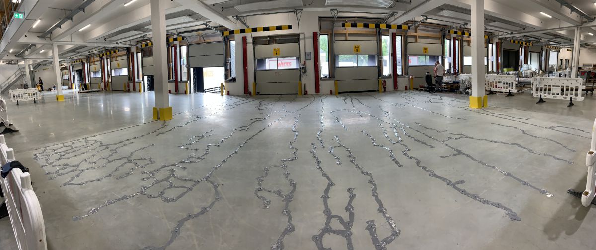 Risssanierung auf einer Stahlbetonsohle nach WHG